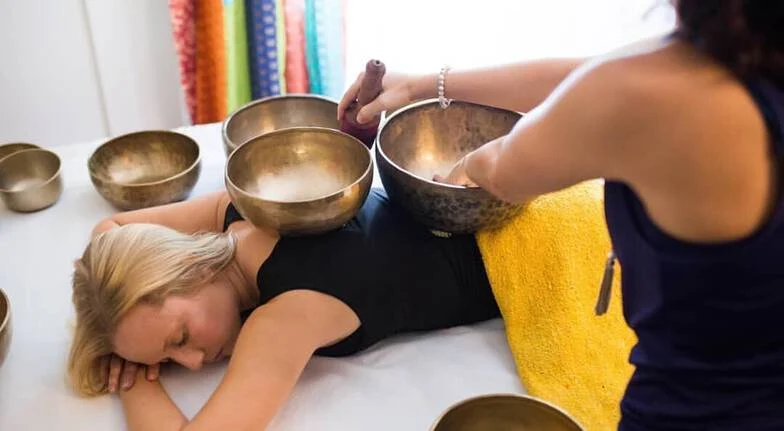 therapeutic massage with reiki and tibetan sound healing